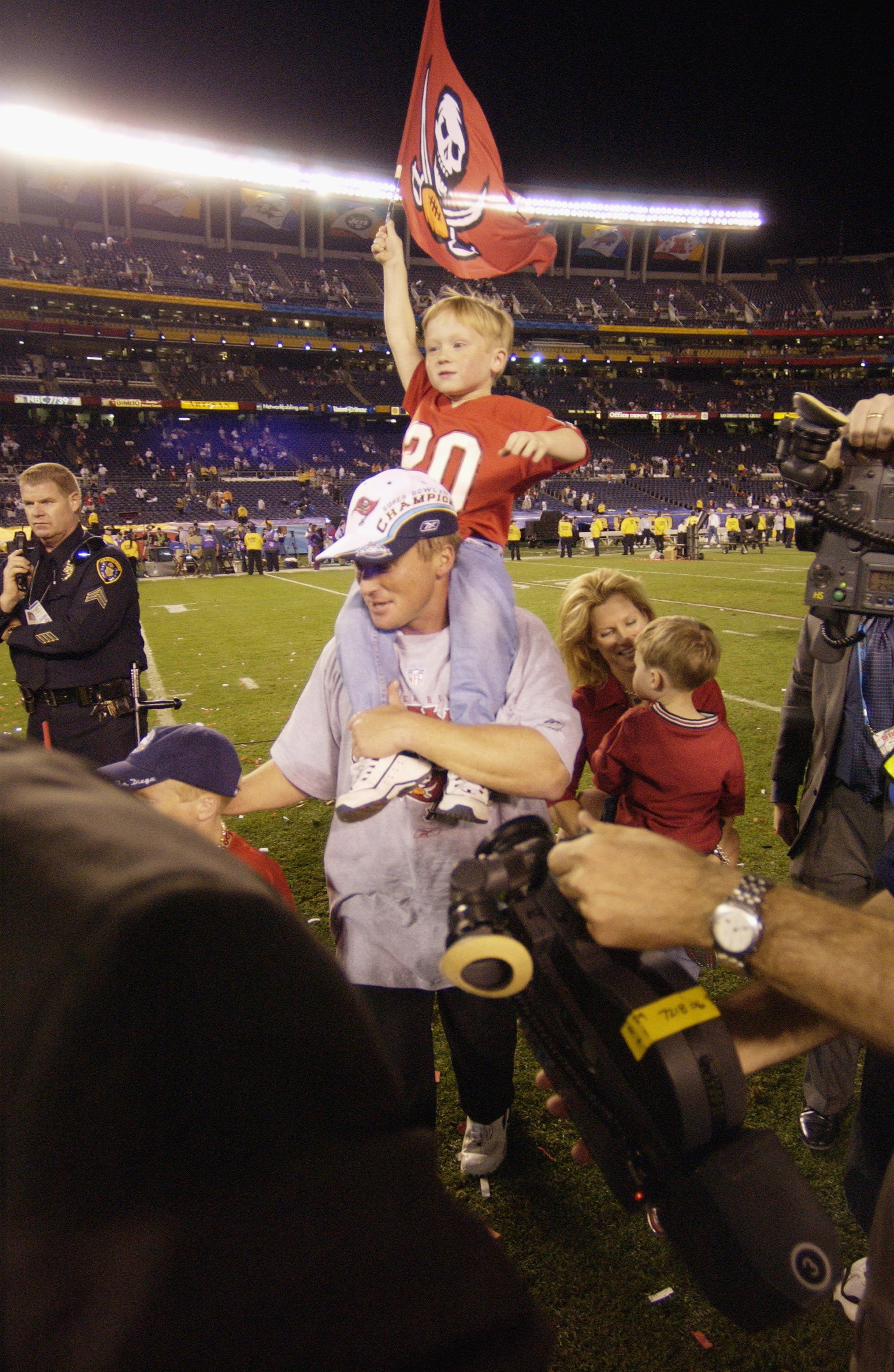 Jon Gruden And Family Walk Off The Field