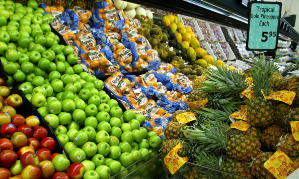 Various fruit and vegetables on the shelves at a 
walmart settlement